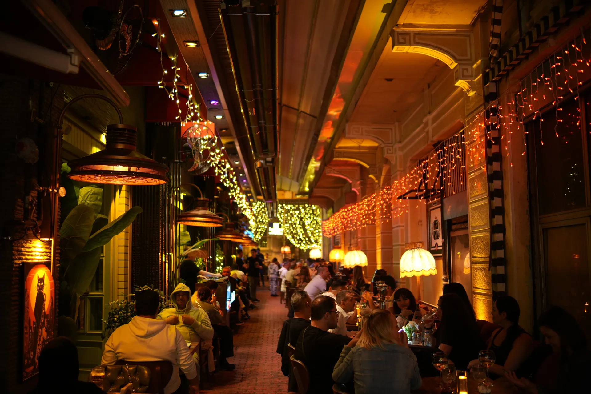 Open-air tables and warm evening lights at Benden Karakoy